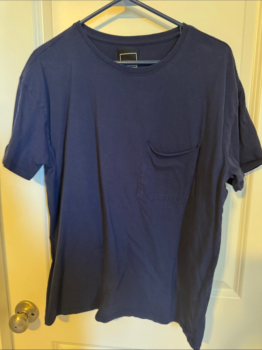 Woman’s Navy Pocket T‑Shirt - Classic Crewneck